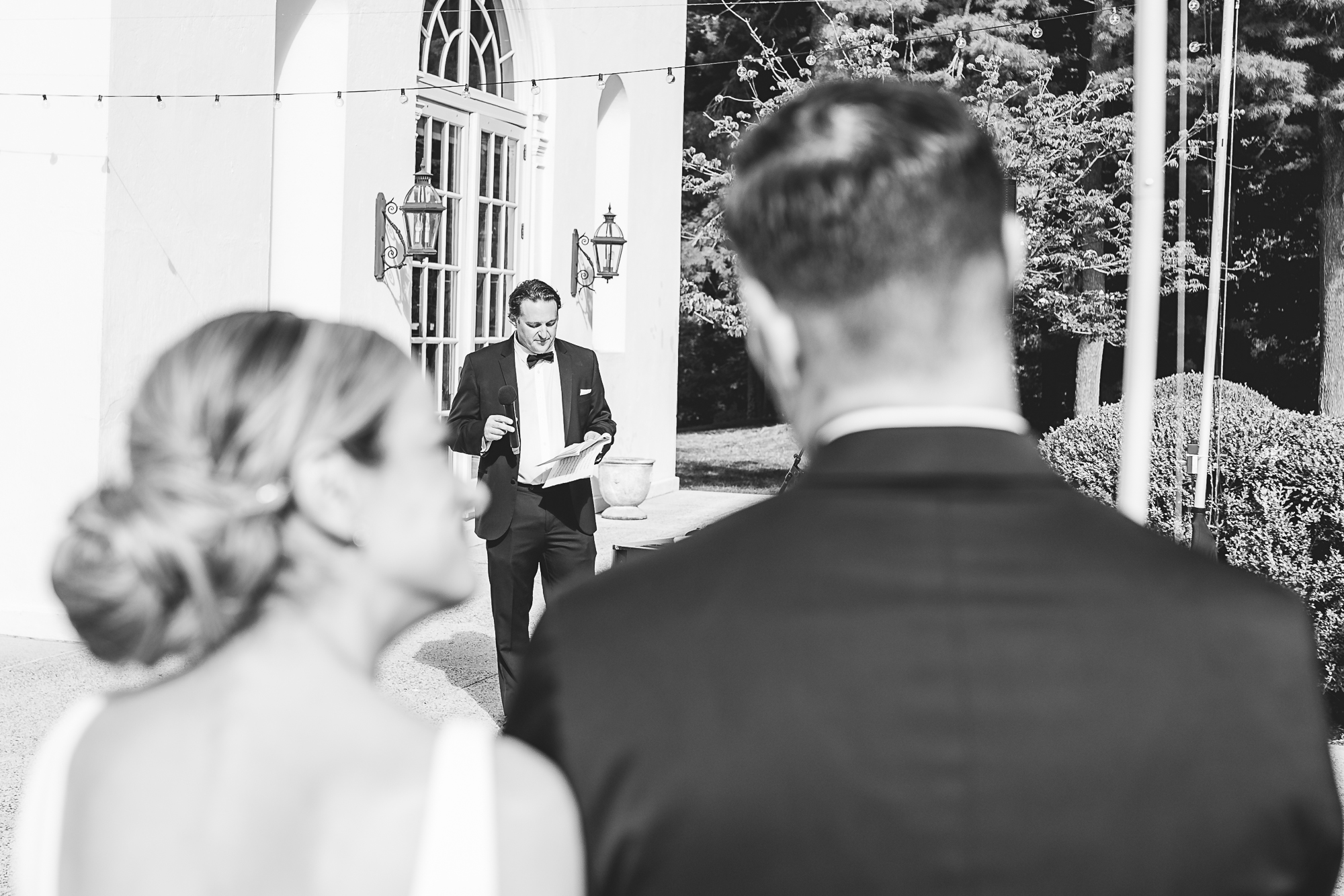 Wedding at The Wadsworth Mansion at Long Hill in Middletown CT. Bride and groom watching their Best Man deliver his toast.