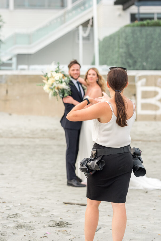 Wedding Photographer with Bride and Groom at Newport Beach House in Newport Rhode Island. 